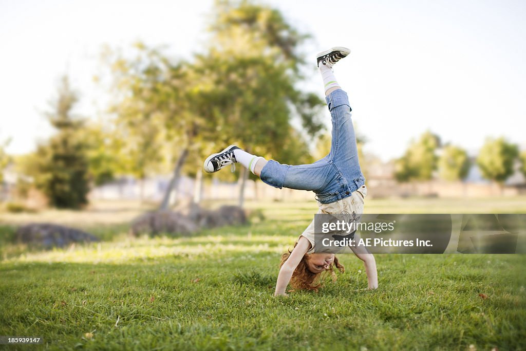 Girl does cartwheel