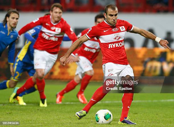 Yura Movsisyan FC Spartak Moscow scores from the penalty spot during the Russian Football League Championship match between FC Spartak Moscow and FC...