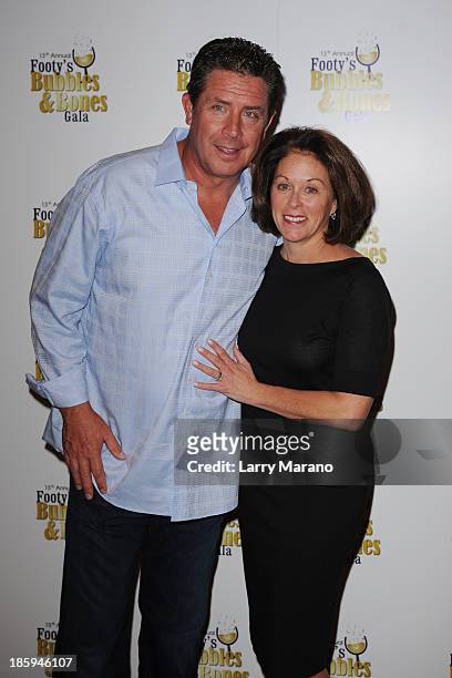 Dan Marino and Claire Marino attend the 13th Annual Footy's Bubbles & Bones Gala at Westin Diplomat on October 25, 2013 in Hollywood, Florida.