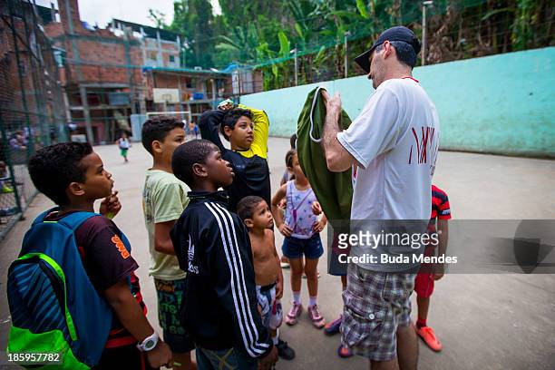 Coach and Manager Alex Sandro training the children at the Vila Nova Project in the Morro dos Macacos area on October 26, 2013 in Rio de Janeiro,...