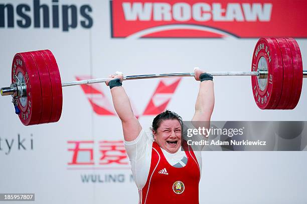Katsiaryna Shkuratava from Belarus lifts in the Clean & Jerk competition women's +75 kg Group A during weightlifting IWF World Championships Wroclaw...