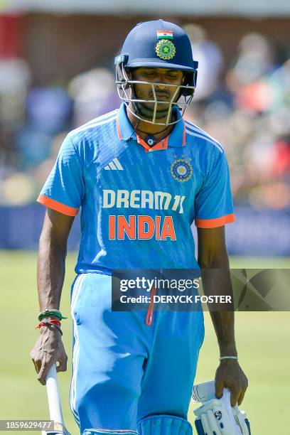 India's Washington Sundar walks back to the pavilion after his dismissal during the second one-day international cricket match between South Africa...