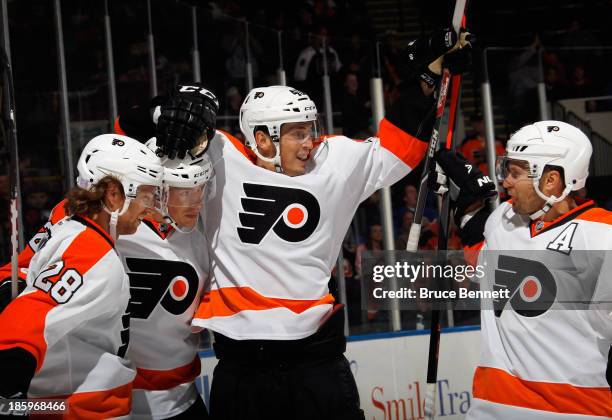 Vincent Lecavalier of the Philadelphia Flyers celebrates his second goal at 18:13 of the first period against the New York Islanders at the Nassau...