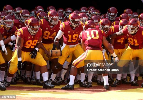 The USC Trojans get ready to run out of the tunnel for the game with the Utah Utes at Los Angeles Coliseum on October 26, 2013 in Los Angeles,...