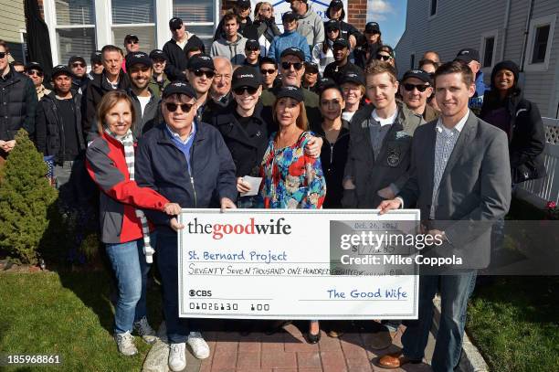 Actors Josh Charles, Jerry Adler, Julianna Margulies, Chris Noth, Archie Panjabi, Matt Czuchry, Zach Grenier present a check to the St. Bernard...