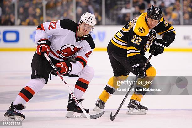 Shawn Thornton of the Boston Bruins skates against Eric Gelinas of the New Jersey Devils at the TD Garden on October 26, 2013 in Boston,...