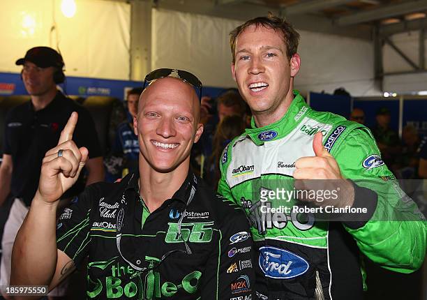 David Reynolds driver of the The Bottle-O FPR Ford and co driver Dean Canto celebrate after taking pole position after qualifying for race 31 of the...