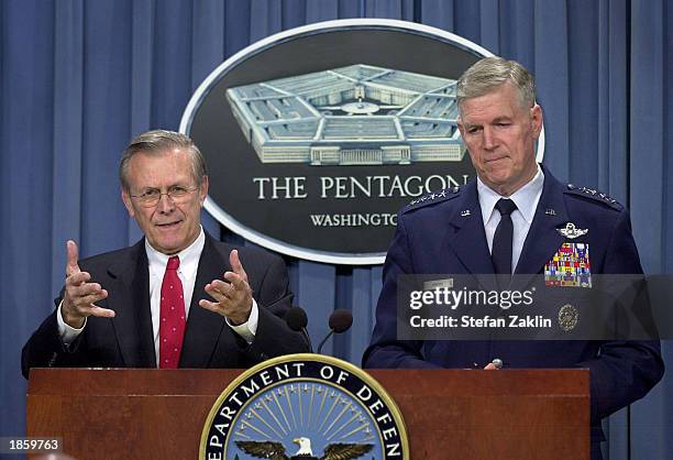 Secretary of Defense Donald Rumsfeld and the Chairman of the Joint Chiefs of Staff General Richard Myers at the Pentagon March 20, 2003 in Arlington,...