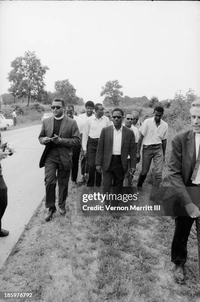 American Civil Rights leaders march, with others, to encourage voter registration, Mississippi, June 1966. Among those pictured are Floyd McKissick ,...