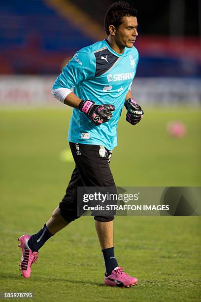 Oswaldo Sanchez of Santos warms up before a match between Atlante and Santos Laguna as part of the Apertura 2013 Liga MX at Olympic Stadium Andres...