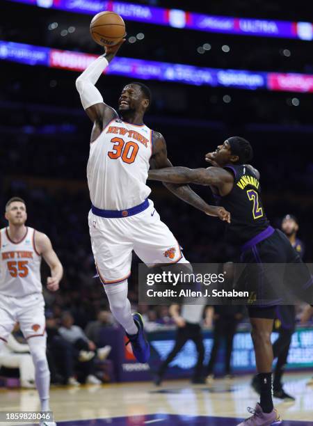 Los Angeles, CA New York Knicks forward Julius Randle is fouled by Los Angeles Laker Jarred Vanderbilt during first half action. Lakers vs Knicks at...