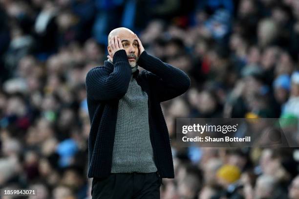 Pep Guardiola, Manager of Manchester City, reacts during the Premier League match between Manchester City and Crystal Palace at Etihad Stadium on...