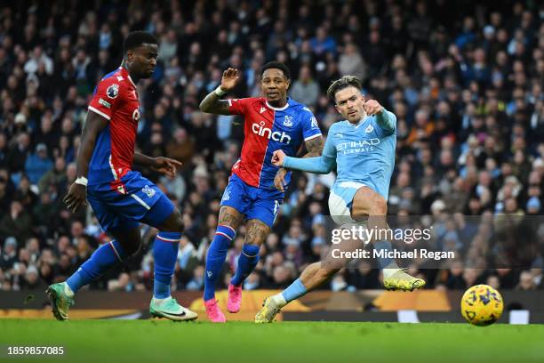 Jack Grealish of Manchester City scores their team's first goal during the Premier League match between Manchester City and Crystal Palace at Etihad...