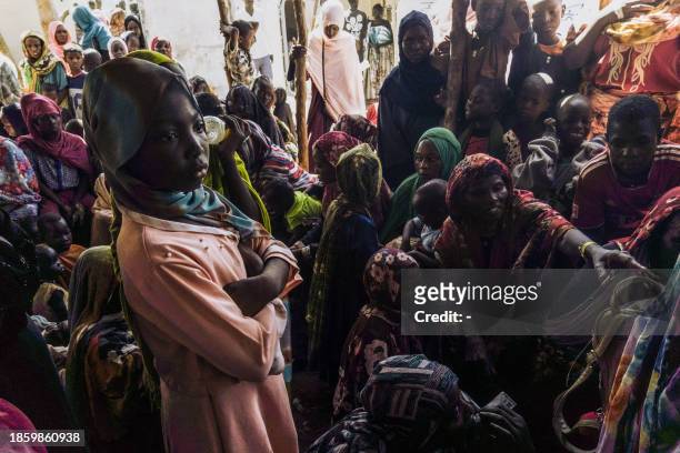 Civilians fleeing conflict in Sudan wait for asylum registration procedures at the United Nations High Commissioner, in Renk, South Sudan on December...