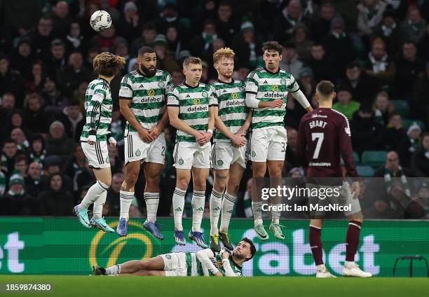 Stephen Kingsley of Hearts free kick heads goal wards for his team's second goal during the Cinch Scottish Premiership match between Celtic FC and...