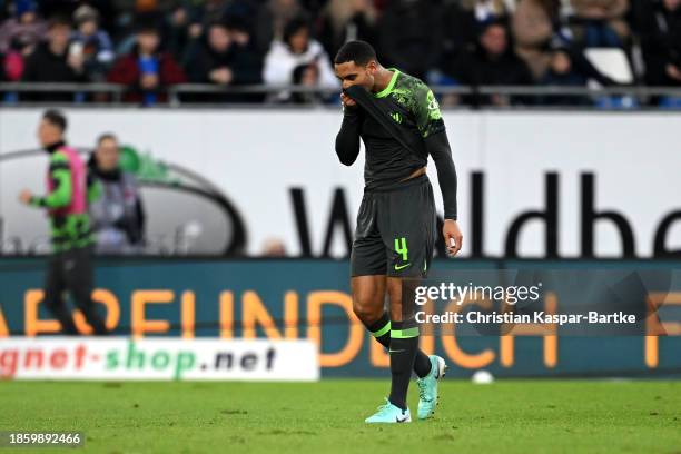 Maxence Lacroix of VfL Wolfsburg reacts after being shown a red card during the Bundesliga match between SV Darmstadt 98 and VfL Wolfsburg at...