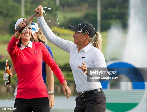 Suzann Pettersen is showered with Taiwan Beer by two of her fellow competitors on the 18th green, during day four of the Sunrise LPGA Taiwan...