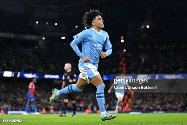 Rico Lewis of Manchester City celebrates after scoring their team's second goal during the Premier League match between Manchester City and Crystal...