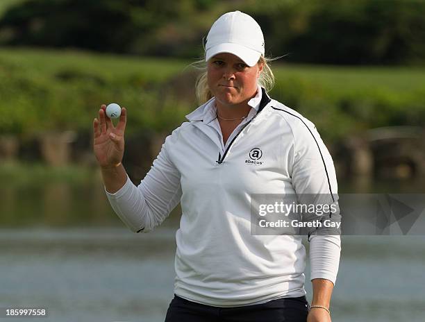 Caroline Hedwall of Sweden hold up her Golf ball, after putting on the 18th hole, during day four of the Sunrise LPGA Taiwan Championship on October...