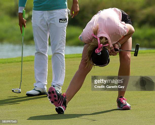 Paula Creamer of the U.S.A reacts after missing a putt on the 18th green, during day four of the Sunrise LPGA Taiwan Championship on October 27, 2013...