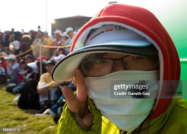 Spectators watch play on the 18th green during day four of the Sunrise LPGA Taiwan Championship on October 27, 2013 in Taoyuan, Taiwan.