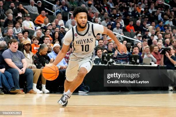 Jayden Epps of the Georgetown Hoyas drives to the basket during a college basketball game against the Syracuse Orange at the Capital One Arena on...