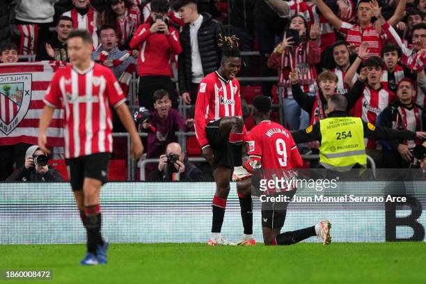 Nico Williams of Athletic Club celebrates with teammate Inaki Williams after scoring their team's second goal during the LaLiga EA Sports match...