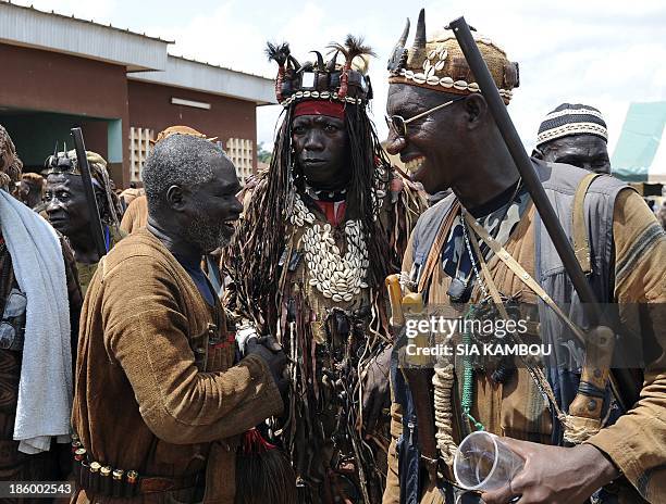 Traditional Ivorian Dozo hunters, members of the Binkadi association that gathers all Dozos in the region, gather on September 27, 2013 in Kani, in...