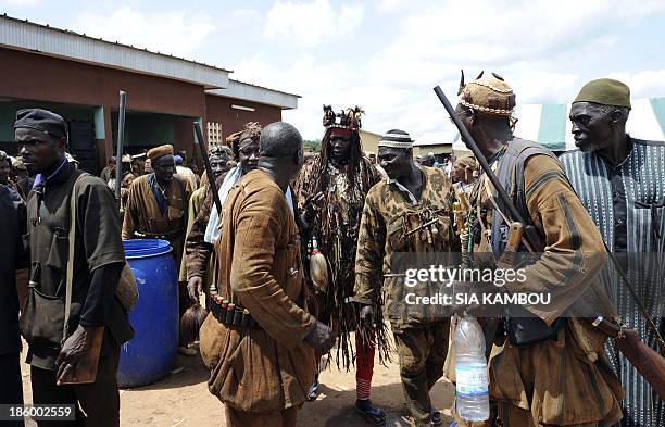 Traditional Ivorian Dozo hunters, members of the Binkadi association that gathers all Dozos in the region, gather on September 27, 2013 in Kani, in...