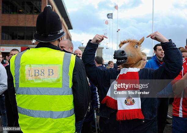 Sunderland fan with a horses head reacts before the Barclays Premier League match between Sunderland and Newcastle United at Stadium of Light on...