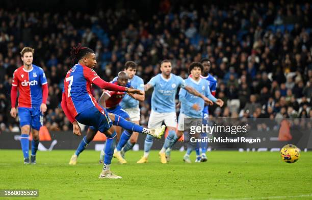 Michael Olise of Crystal Palace scores their team's second goal from the penalty spot during the Premier League match between Manchester City and...
