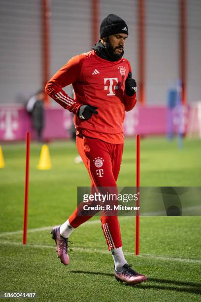 Eric Maxim Choupo-Moting of FC Bayern Muenchen jogs around the slalom poles during a training session at on December 16, 2023 in Munich, Germany.