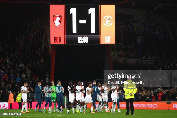 General view of the inside of the stadium as players of Luton Town applaud the fans after the match is suspended after Tom Lockyer of Luton Town...