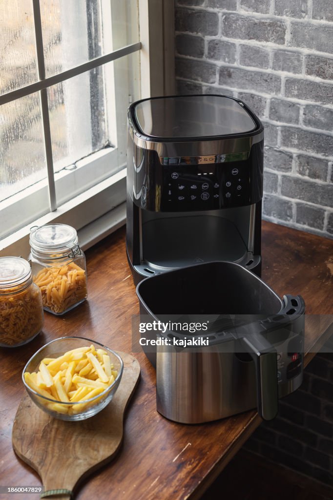 Air fryer machine on the kitchen counter