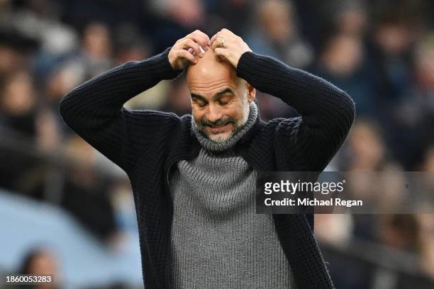 Pep Guardiola, Manager of Manchester City, reacts during the Premier League match between Manchester City and Crystal Palace at Etihad Stadium on...
