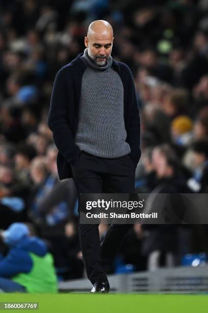 Pep Guardiola, Manager of Manchester City, looks dejected during the Premier League match between Manchester City and Crystal Palace at Etihad...