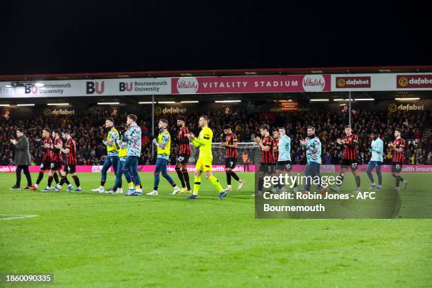 Head Coach Andoni Iraola of Bournemouth leads his side out to applaud fans after game was abandoned after Tom Lockyer of Luton Town needed lengthy...