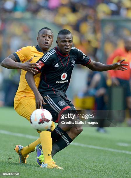 Tsepo Masilela of Chiefs and Khethokwakhe Masuku of Pirates during the Absa Premiership match between Orlando Pirates and Kaizer Chiefs at FNB...