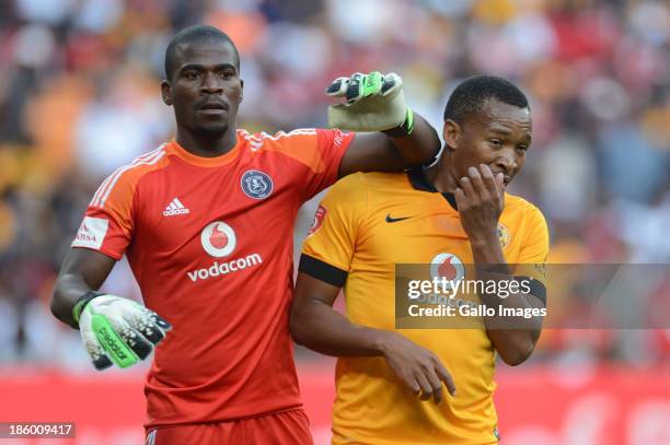 Senzo Meyiwa of Orlando Pirates and Lehlohonolo Majoro of Kaiser Chiefs during the Absa Premiership match between Orlando Pirates and Kaizer Chiefs...