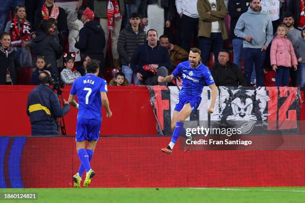 Borja Mayoral of Getafe CF celebrates after scoring their team's first goal from the penalty spot during the LaLiga EA Sports match between Sevilla...