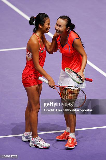 Hsieh Su-Wei of Chinese Taipei and Peng Shuai of China celebrate victory against Ekaterina Makarova and Elena Vesnina of Russia after the Doubles...