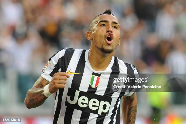 Arturo Vidal of Juventus celebrates after scoring the opening goal during the Serie A match between Juventus and Genoa CFC at Juventus Arena on...