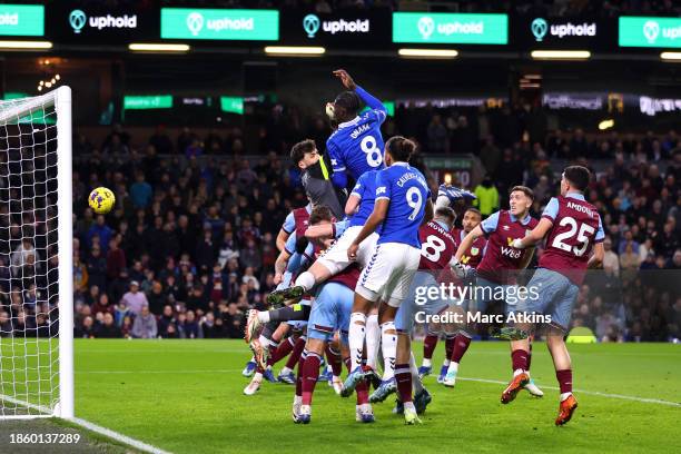 Amadou Onana of Everton scores their team's first goal during the Premier League match between Burnley FC and Everton FC at Turf Moor on December 16,...