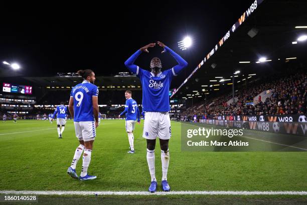 Amadou Onana of Everton celebrates after scoring their team's first goal during the Premier League match between Burnley FC and Everton FC at Turf...