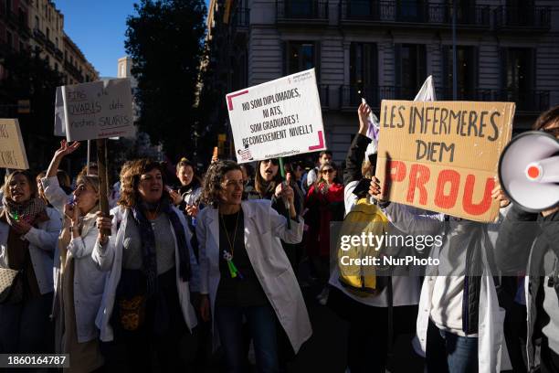 Hundreds of Catalan public health professionals, such as nurses, midwives, social workers, and administrative technicians, are demonstrating and...