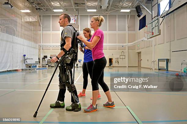 An exoskeleton senses a patient's intentions by leaning, then helps complete the step. James Nall stood for more than 40 minutes and took 819 steps...