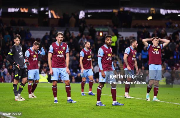 Burnley players react during the Premier League match between Burnley FC and Everton FC at Turf Moor on December 16, 2023 in Burnley, England.