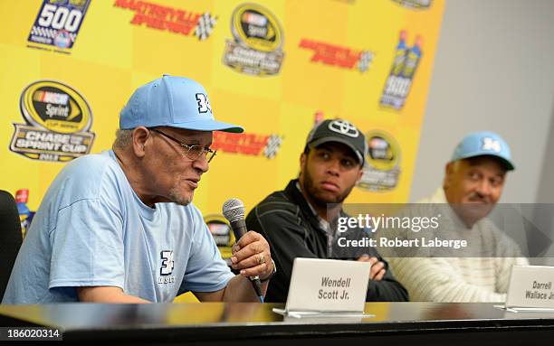 Wendell Scott Jr., son of Wendell Scott, Darrell Wallace Jr., driver of the ToyotaCare Toyota, and Franklin Scott, son of Wendell Scott, speak during...