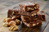 Chocolate brownies with nuts on the table