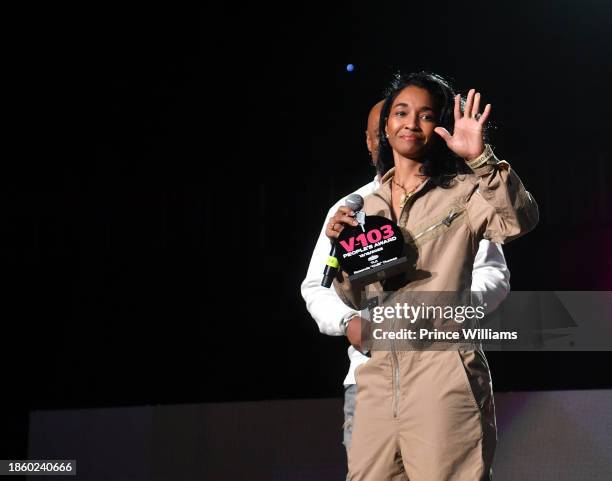 Rozonda Chilli Thomas Onstage during Winterfest at State Farm Arena on December 15, 2023 in Atlanta, Georgia.